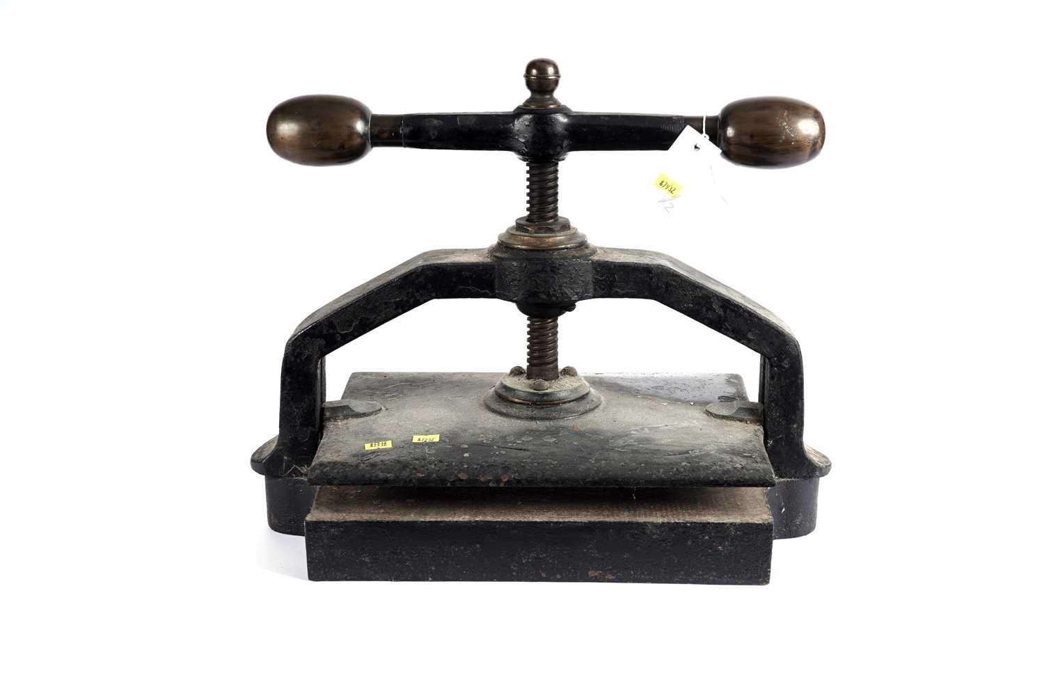 A Victorian cast metal book press