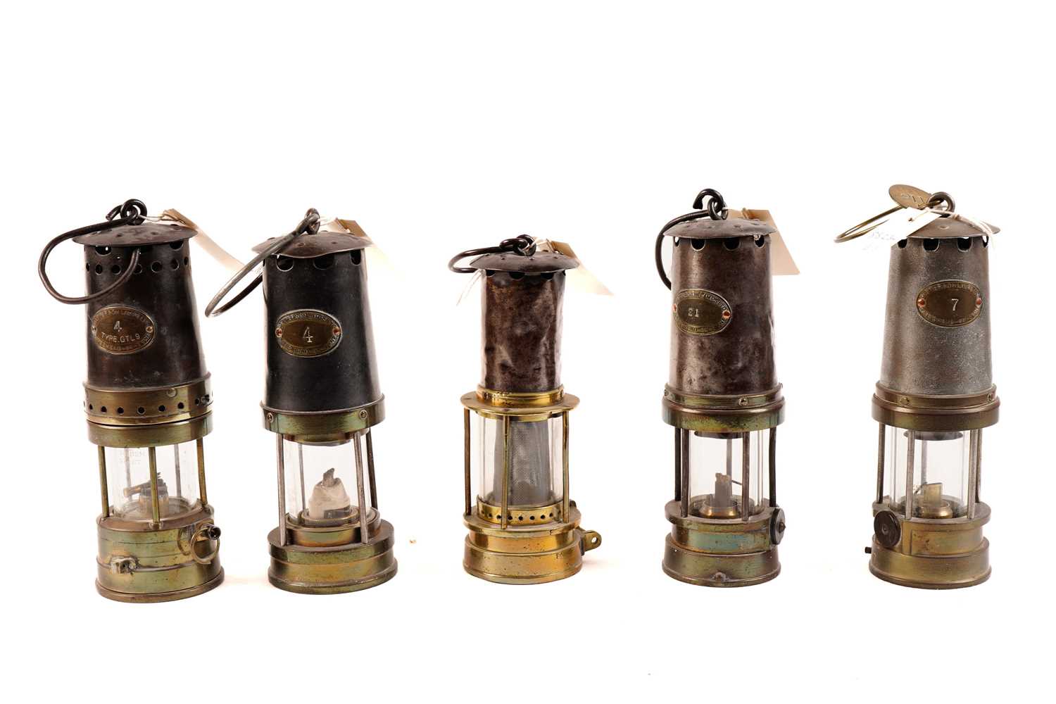 A collection of Patterson & Co miners lamps