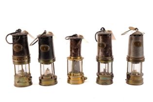 A collection of Patterson & Co miners lamps
