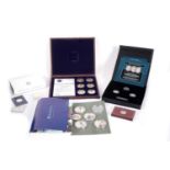A collection of QEII gold-plated cupro-nickel presentation coin sets