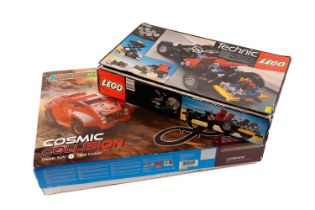 A Lego Technic set; and a Micro Scalextric set