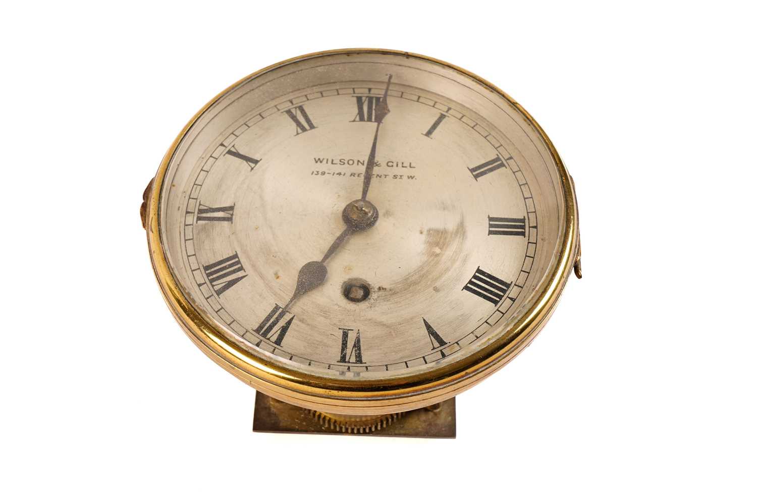 A brass cased ships clock dial and movement