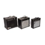 Three small guitar amplifiers