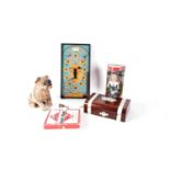 A collection of vintage toys including Monopoly, Treasure Hunt bagatelle, and others