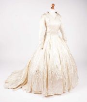 A 1950s Edythe M. Pegg champagne sprigged-rose damask wedding dress