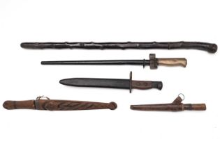 A 20th Century carbine bayonet; French Lebel bayonet; 19th Century small sword stick; and others