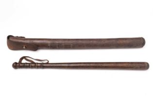 An early 20th Century mounted police truncheon with sprung leather saddle-mounting case