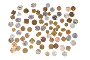 Eighty-two National Coal Board pit check tokens