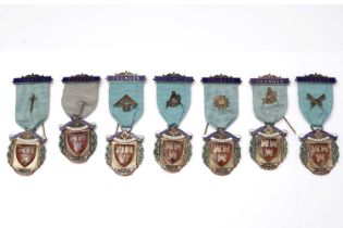 Seven silver-gilt and enamel Masonic Founder medals for Newcastle City Lodge