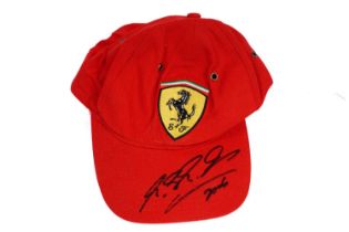 An autographed F1 Formula One Motorsports Ferrari cap