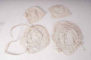 A Victorian Ayrshire lace baby bonnet, and others