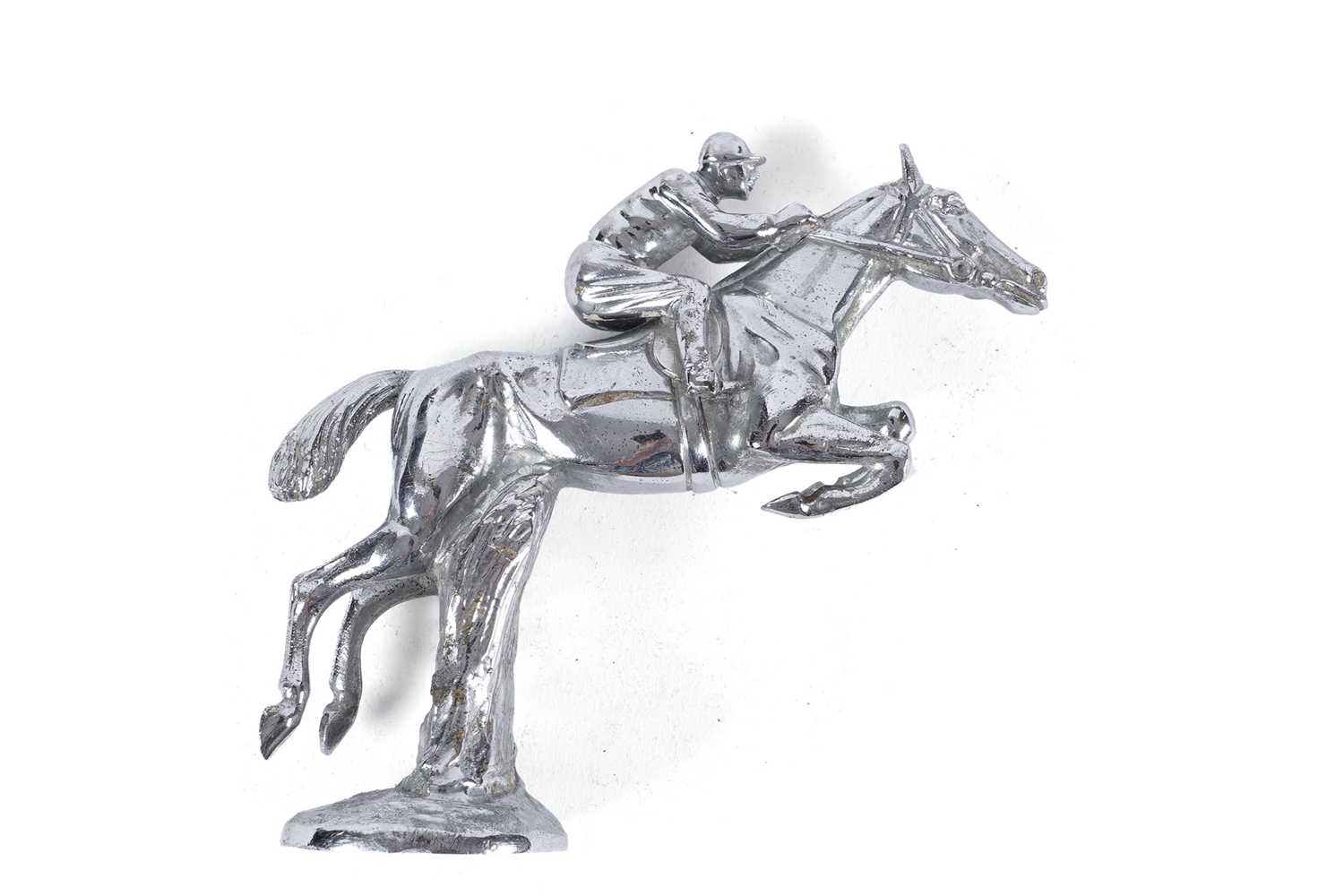 Louis Lejeune: a chromed cast metal car mascot