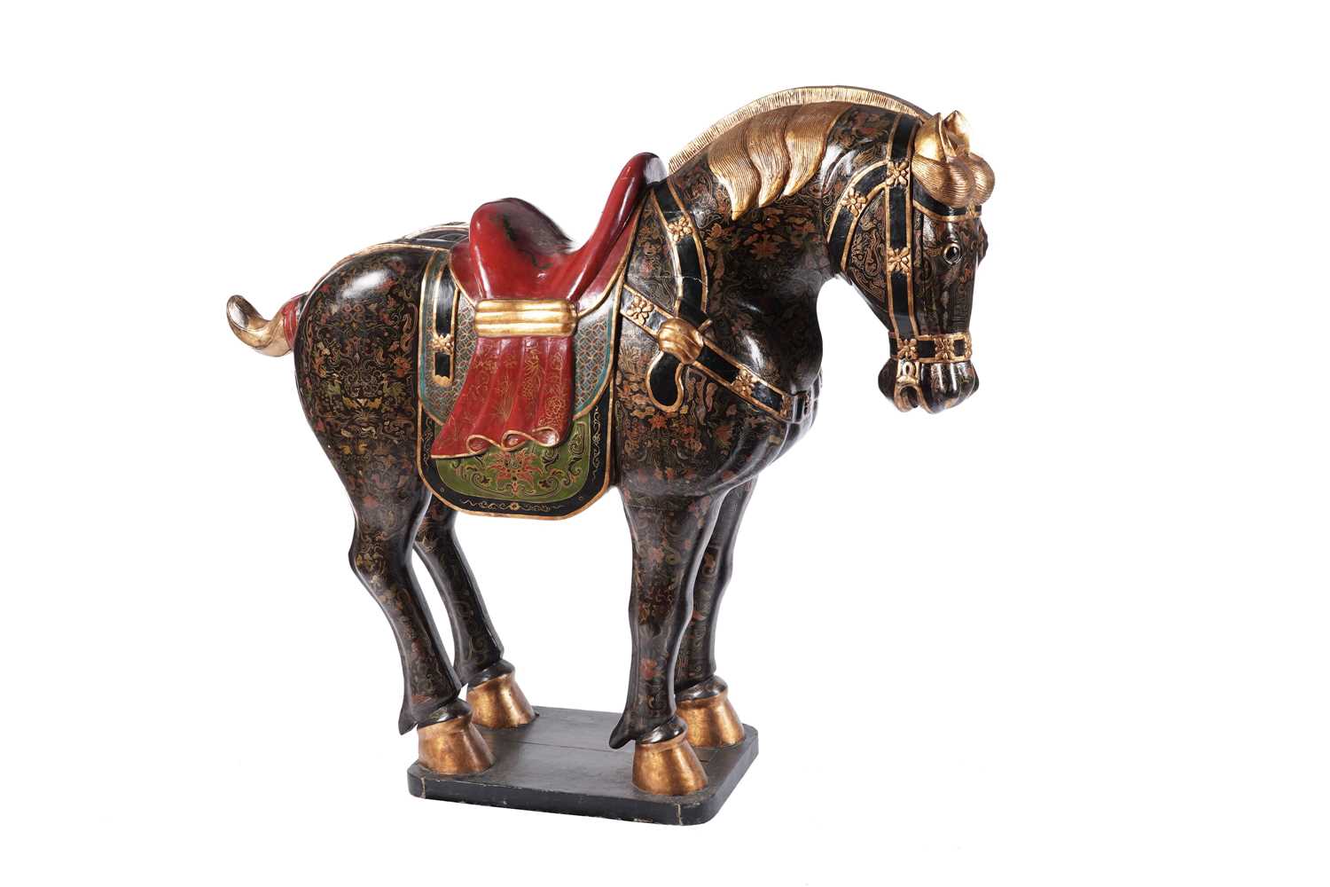 A large modern Chinese Tang style carved and painted wooden horse