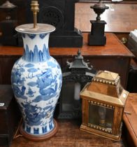 A Chinese blue and white baluster vase mounted as a table lamp 58 cm high overall, to/w metal wall