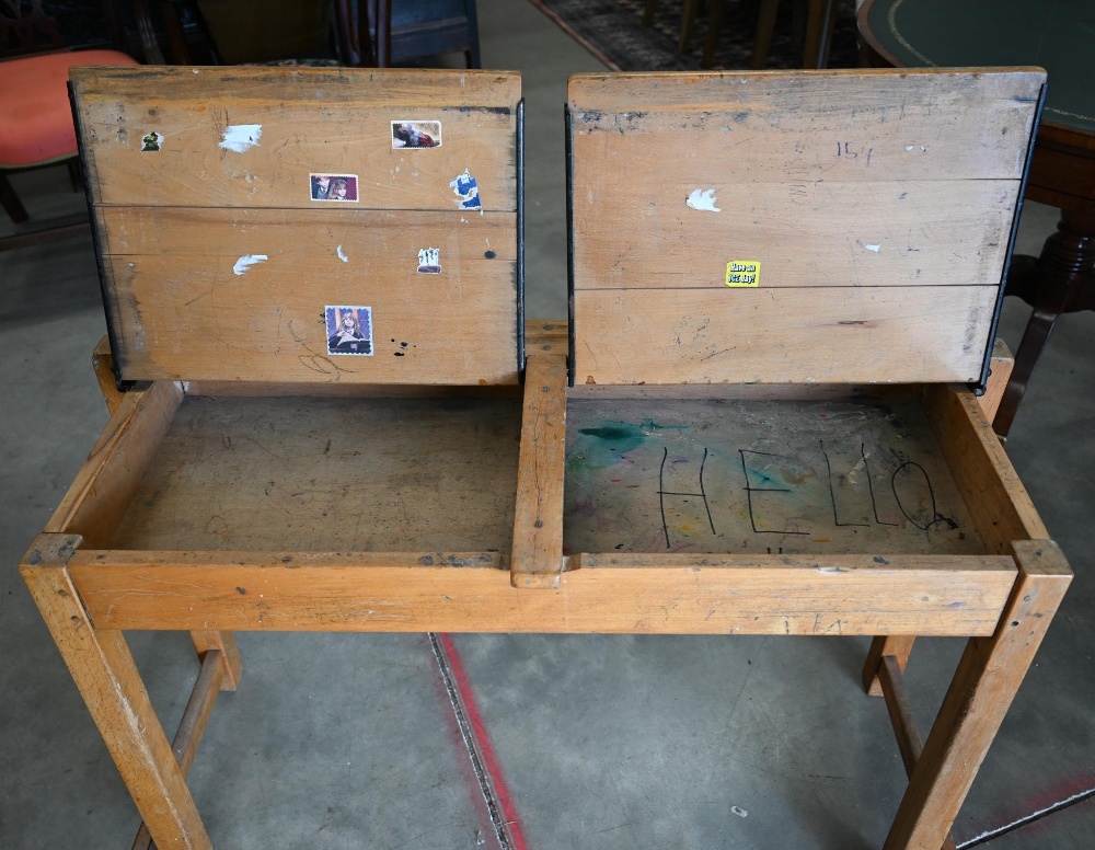 A vintage beech double school desk with twin-hinged panelled top, 108 cm wide x 40 cm deep x 66 cm - Image 4 of 4