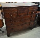 A large Victorian millinery chest with arrangement of eight drawers raised on shaped bracket feet,