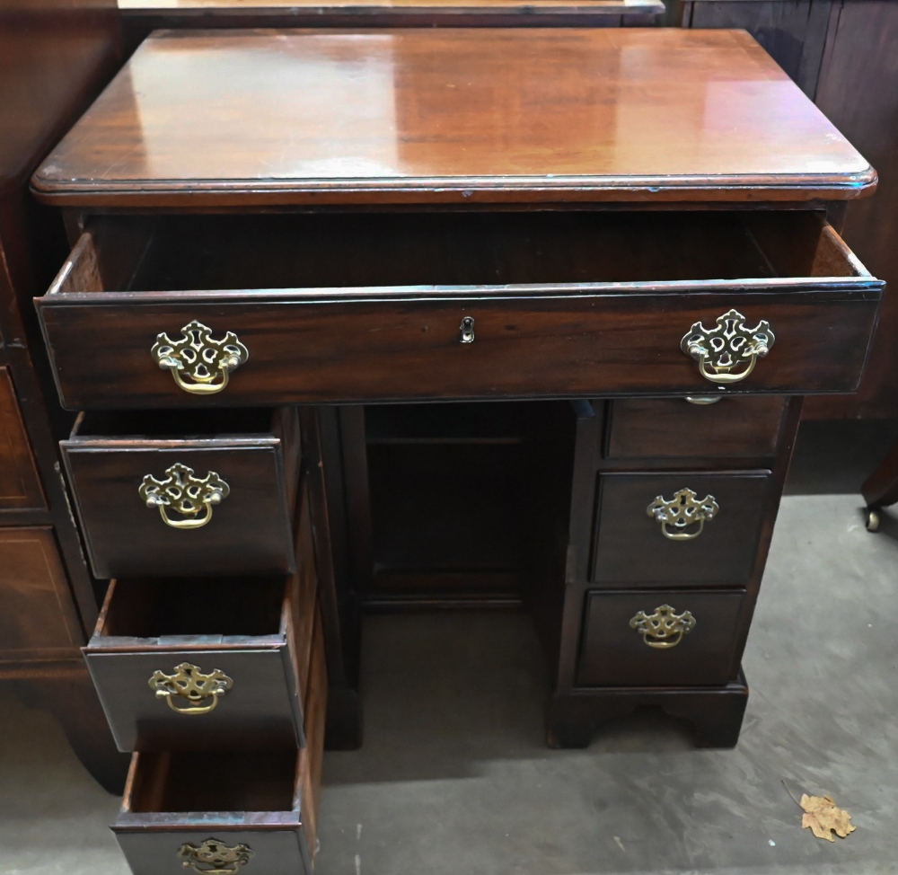 A George III mahogany kneehole desk with seven drawers and secret frieze drawer over recessed - Image 3 of 3