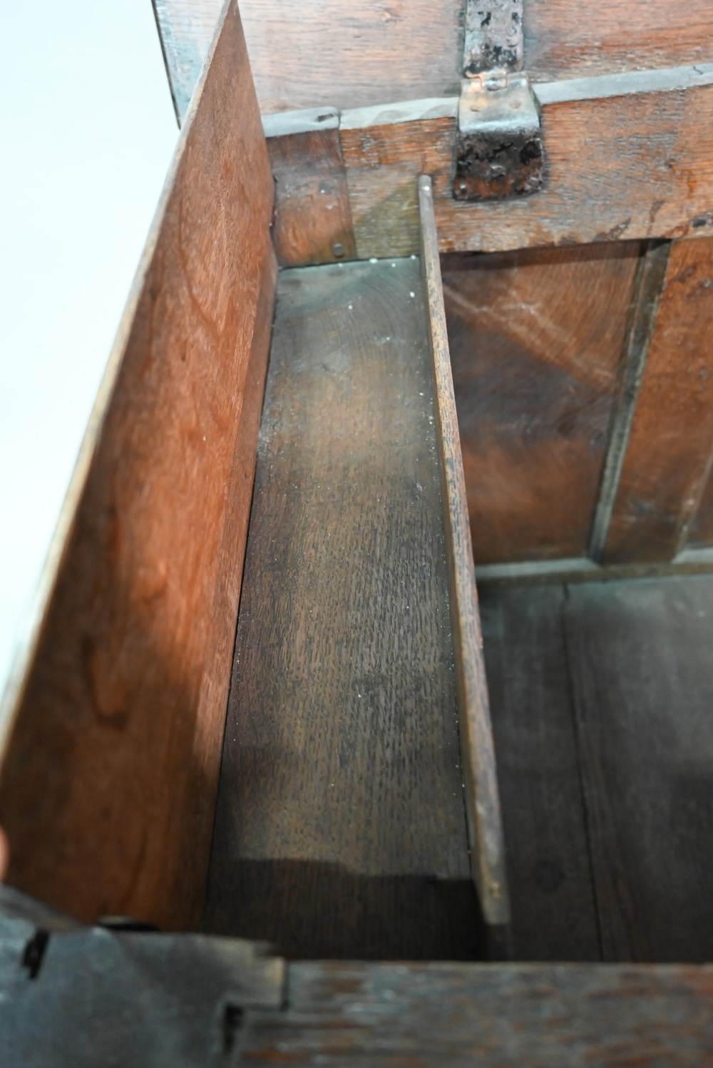 An 18th century oak mule chest, the three plank top over four fielded arched panels and three - Image 6 of 9