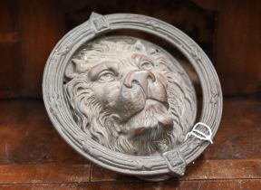 A large vintage brass lion-mask and ring door-knocker, 21 cm diam overall to/w a pair of metal