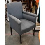 An early 20th century mahogany framed bedroom chair, light grey fabric upholstery, turned front legs