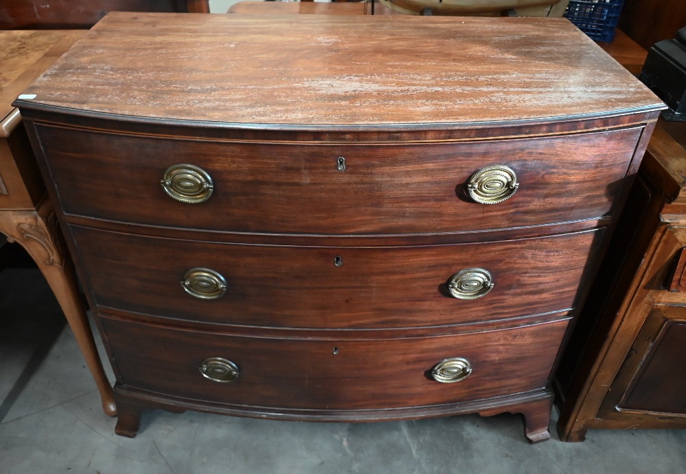 A Georgian mahogany bowfront chest of three long drawers raised on shaped bracket feet, 100 x 50 x - Image 2 of 3