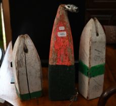 Three painted wood maritime stay-blocks (one as a table lamp) to/w a netted string of five glass