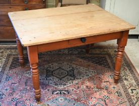 A vintage pine kitchen table on turned legs, 114 x 88 x 74 cm high