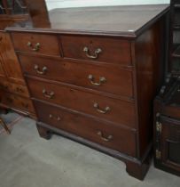 A George III mahogany chest of two short over three long drawers standing on bracket feet, 110 cm