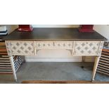 An Oka Cosimo two-tone grey painted writing table with three drawers on turned fluted supports