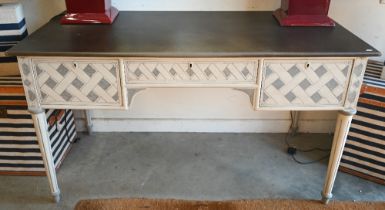 An Oka Cosimo two-tone grey painted writing table with three drawers on turned fluted supports