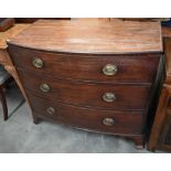 A Georgian mahogany bowfront chest of three long drawers raised on shaped bracket feet, 100 x 50 x