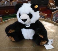 A Steiff panda, 25 cm high (seated)