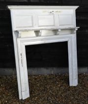 A large antique painted pine chimney piece, with shelf above, overall 127 cm w x 161 cm h,
