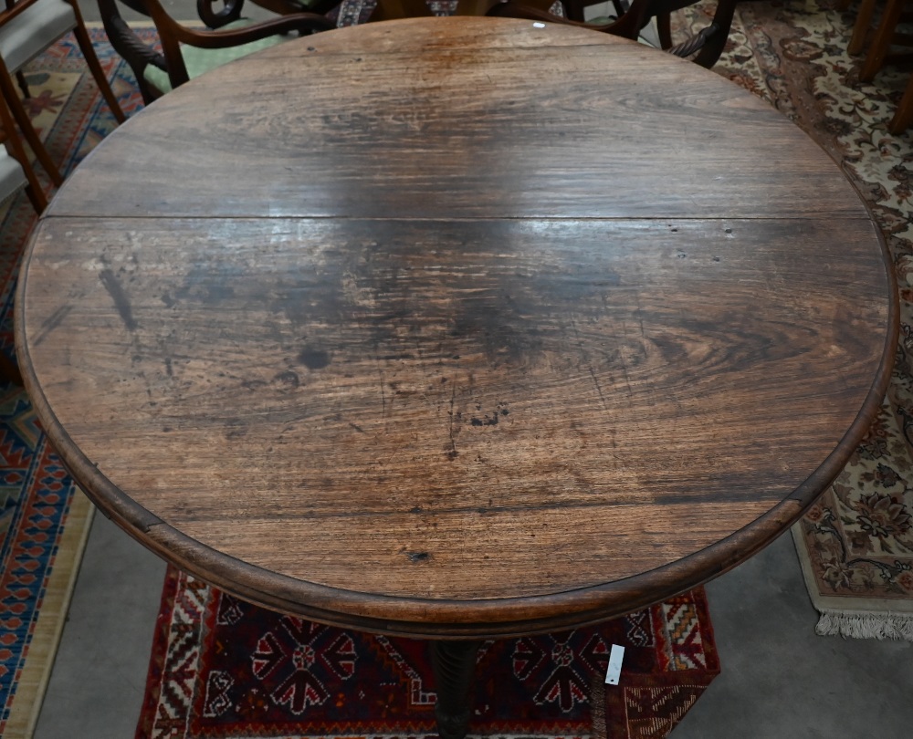 A 19th century mahogany circular campaign dining table on spiral turned supports - Image 4 of 4