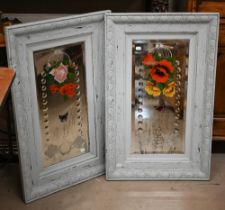 A pair of antique bevelled mirrors, etched and painted with flowers and butterflies with