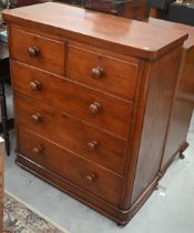 A Victorian mahogany chest of two short over three long drawers with turned handles, 98 x 45 x 112