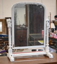 A large arched dressing table mirror in distress-painted off-white frame, 60 cm w x 32 cm d x 78