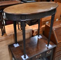 An Edwardian oval Chippendale style occasional table with blind fret decoration overall, 89 cm x