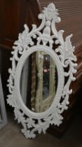 A modern French style oval mirror in painted frame, 60 x 120 cm h to/w Indian style circular