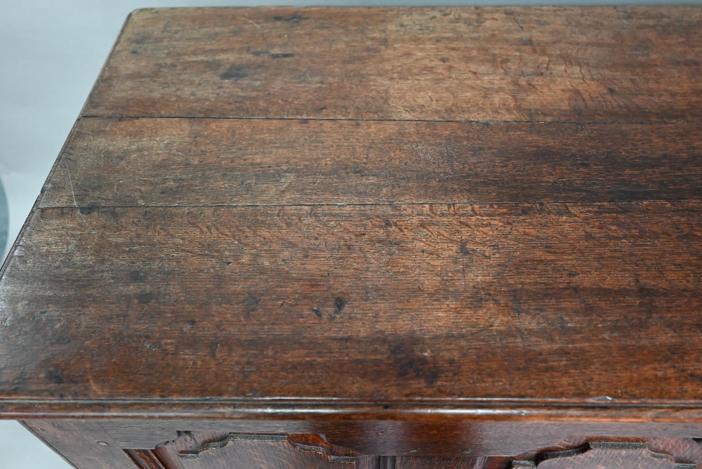 An 18th century oak mule chest, the three plank top over four fielded arched panels and three - Image 8 of 9