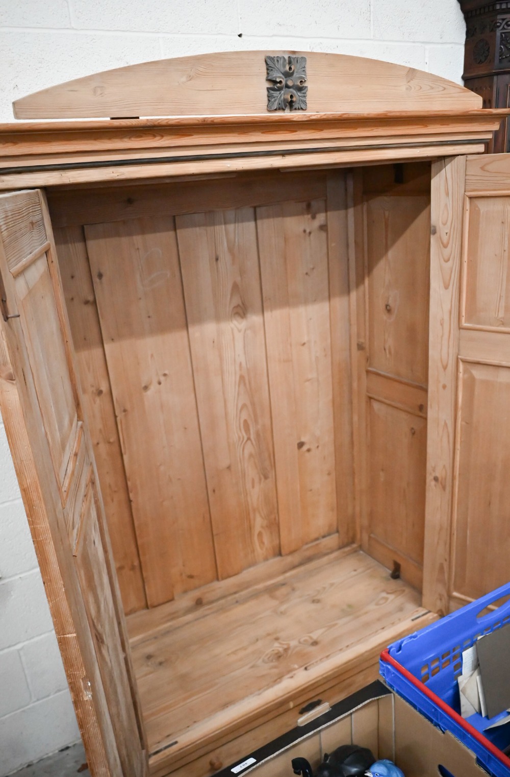 An antique pine knock-down wardrobe with twin panelled doors enclosing open hanging space on - Image 3 of 4