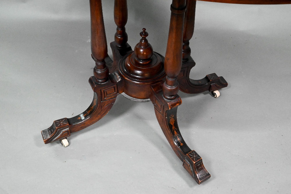 A Victorian inlaid figured walnut centre table, the oval top raised on four to swept legs, on - Image 3 of 6