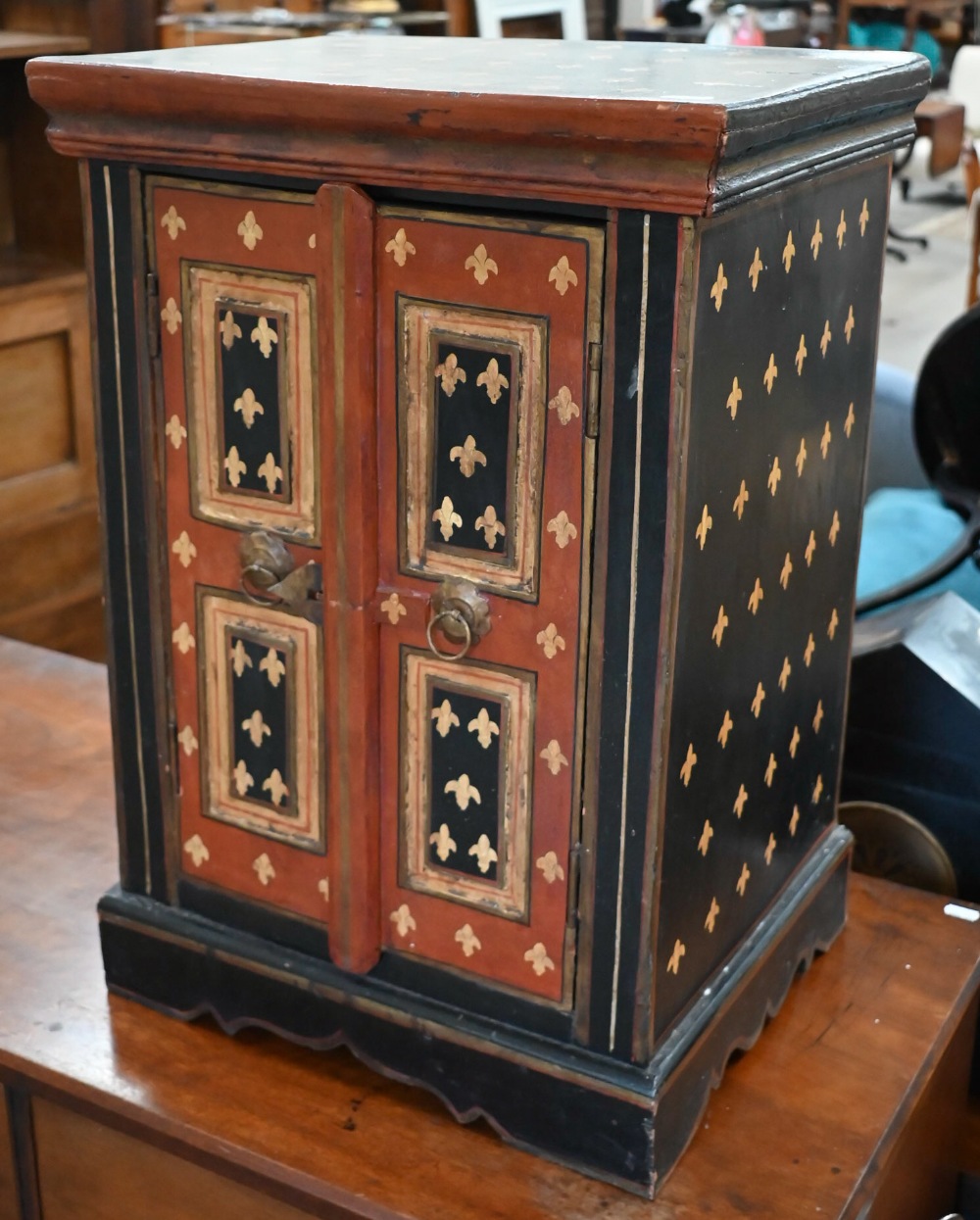 An Asian polychrome painted two door hardwood table cabinet, 42 cm wide x 34 cm deep x 60 cm high