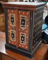 An Asian polychrome painted two door hardwood table cabinet, 42 cm wide x 34 cm deep x 60 cm high