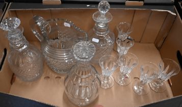 A 19th century cut glass water jug to/w three decanters and an antique set of six port glasses