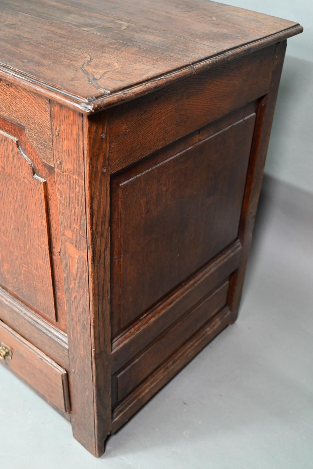 An 18th century oak mule chest, the three plank top over four fielded arched panels and three - Image 9 of 9