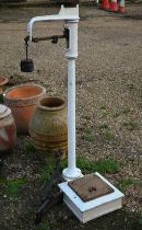 Pooley & Son, Liverpool, a vintage cast iron pillar platform scale, painted white and a/f
