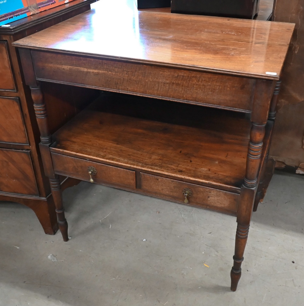 A Victorian mahogany side table with undertier and two drawers raised on turned supports, 75 x 49
