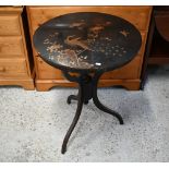 A Japanned circular occasional table lacquered and gilded with kacho-ga (bird and flowers)