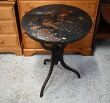 A Japanned circular occasional table lacquered and gilded with kacho-ga (bird and flowers)